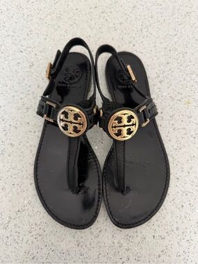 Tory Burch Black Leather Logo Thong Sandals with Gold Medallions